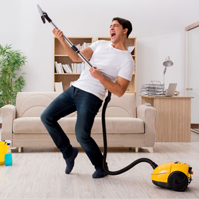 Person doing housework with a vacuum cleaner
