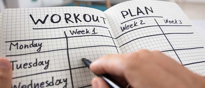 Notebook showing a workout plan