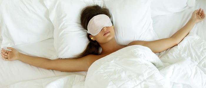 Woman sleeping with eye mask on