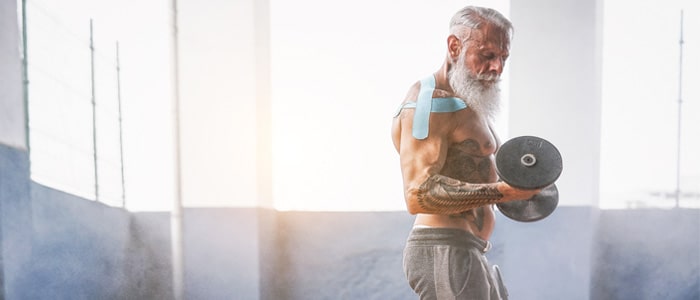 Older man lifting weights