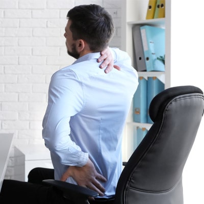 Person sitting down with bad posture